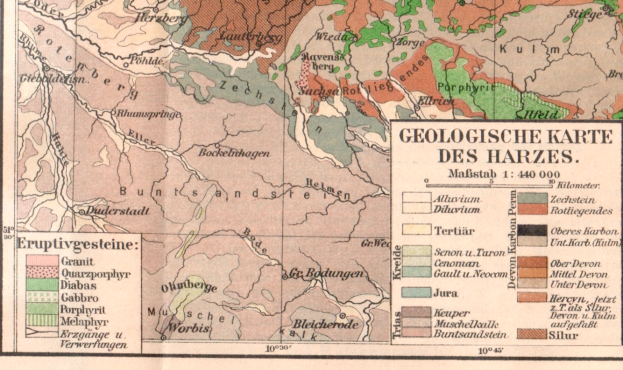 Eine detaillierte Karte der Harz-Region in Deutschland, die Berge, Flüsse, Städte und das Ausmaß des Deutschen Reichs zeigt, mit begleitendem Text, der zusätzliche geografische Informationen bereitstellt.