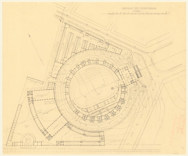 Schwarz-weißes architektonisches Zeichnung eines Stadiongrundrisses mit umliegenden Gebäuden und handschriftlichen Textanmerkungen.