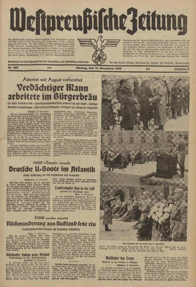 Schwarze Titelseite einer deutschen Zeitung vom 13. November 1939, betitelt "Weitpreubliche Zeitung", mit einer Gruppe von Menschen in traditioneller deutscher Tracht in einer feierlichen Umgebung.