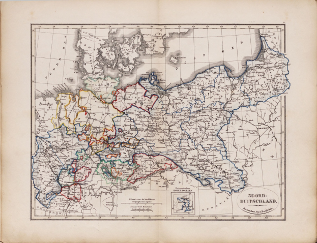 Altes Buch offen zu einer detaillierten historischen Karte von Deutschland und den Niederlanden mit beschrifteten Provinzen, Städten und geografischen Merkmalen.
