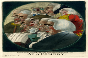 Eine Gruppe von Menschen, die in einem Kreis bei einer Comedy-Veranstaltung lachen, wobei eine Person ein Blatt Papier hält.